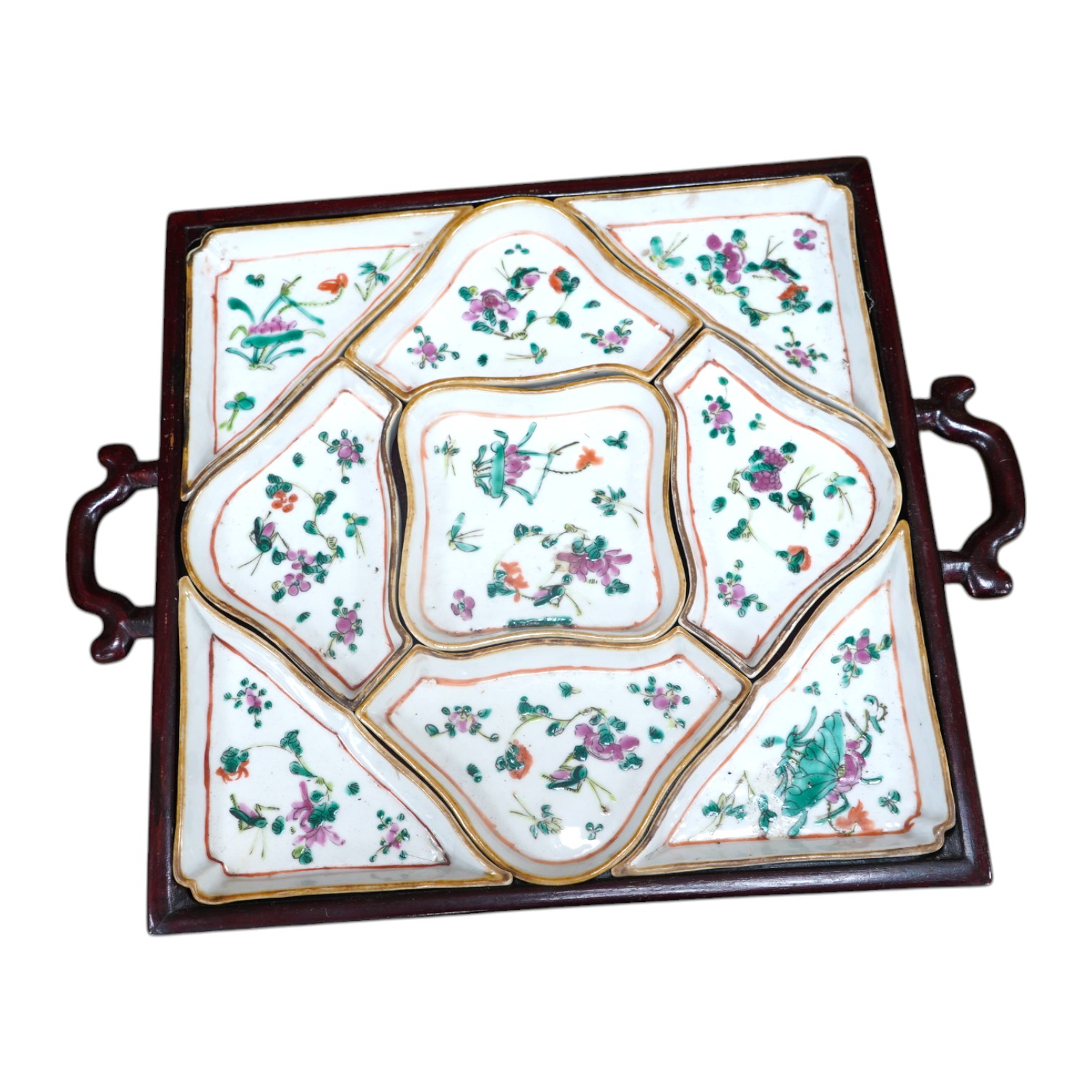 A square Chinese hardwood tray of famille rose geometric dishes, 30cm. Condition - fair to good